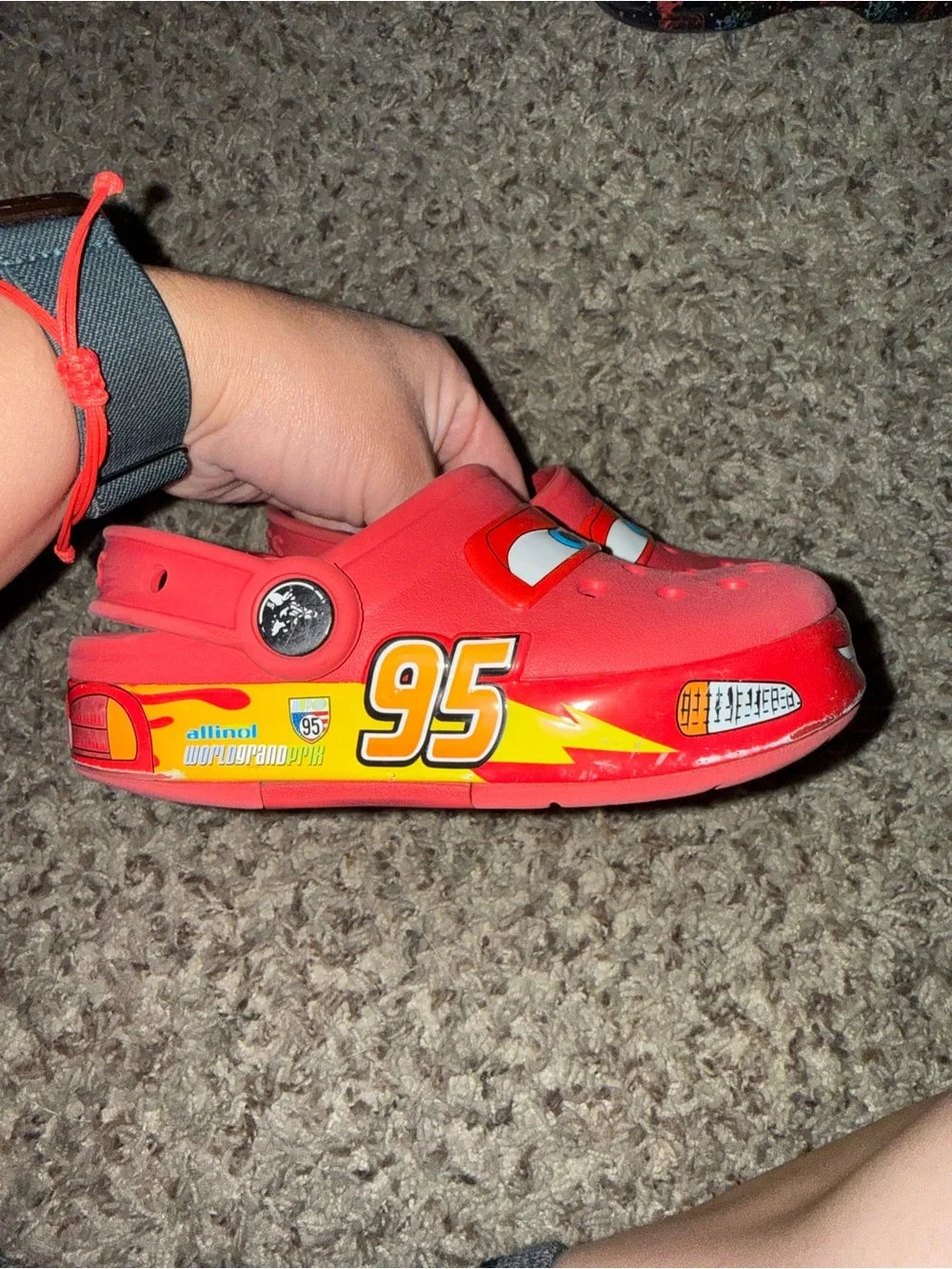 CROCS Red Kids Slip-On Clogs with Playful Eye Graphic